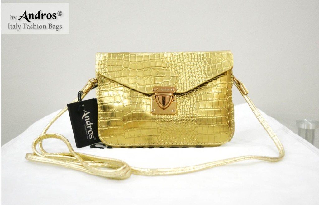 AB9355 IDR 135.000 MATERIAL PU SIZE L18XH13X3CM WEIGHT 350GR COLOR GOLD